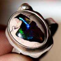 A thousand fires, reflection ring in sterling silver and cantera opal
