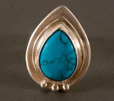 Custom sterling silver ring with turquoise