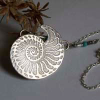 Nautilus, stability and longevity seashell necklace in sterling silver