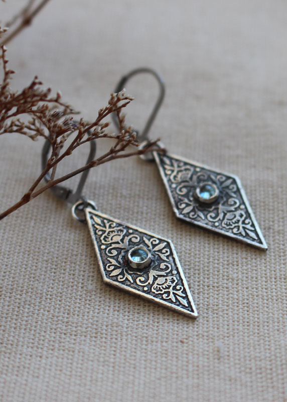 Belladonna, Renaissance floral earrings in silver and blue zircon