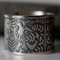 Made of air and water, otomi fish and bird ring in silver