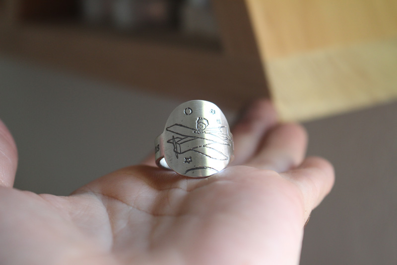 Make your life a dream and a dream a reality, the little prince’s plane ring in silver