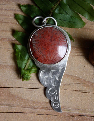 Hiko, bird wing pendant in sterling silver and red coral