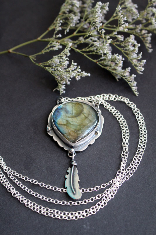 A bird left a feather on my window sill, feather necklace in sterling silver and labradorite