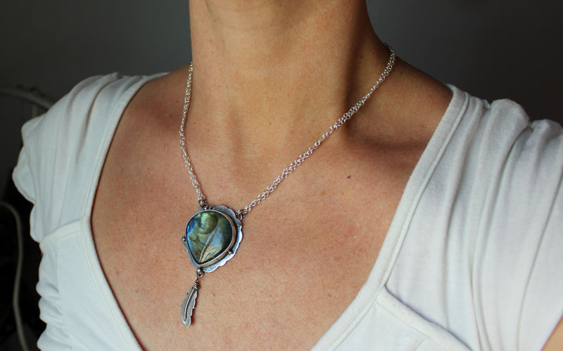 A bird left a feather on my window sill, feather necklace in sterling silver and labradorite