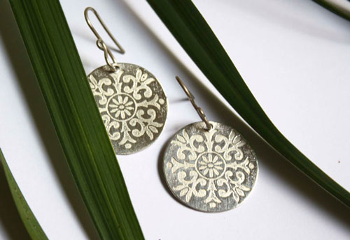 Alixia, baroque fleur-de-lis disk earrings in sterling silver