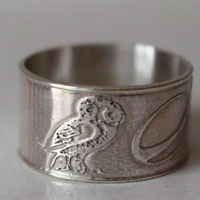 Conviction, personal symbols ring in sterling silver