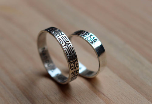 Diapason, Polynesian symbol wedding bands in sterling silver