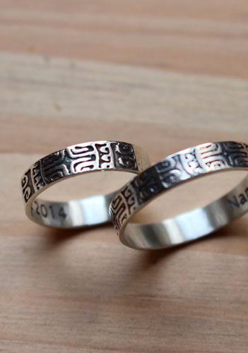 Diapason, Polynesian symbol wedding bands in sterling silver