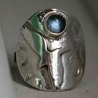 Free, eagle ring in sterling silver and blue zircon