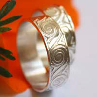 Oceanid, wedding rings set with Greek wave meander in sterling silver
