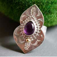 Oditi, raised of the oriental sun ring in sterling silver, brass and amethyst
