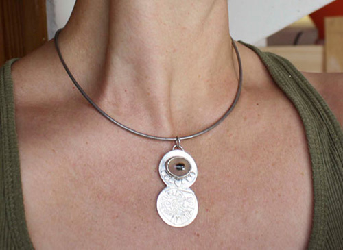 Phaistos, phaistos disc engraved pendant in sterling silver and dendritic agate