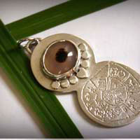 Phaistos, phaistos disc engraved pendant in sterling silver and dendritic agate
