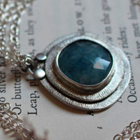 The eye of the sea, marine life necklace in sterling silver and aquamarine