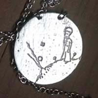 The Little Prince, volcano and planet necklace in sterling silver