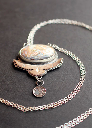 Unfold your wings, eagle carrying the full moon necklace in sterling silver and Mexican crazy lace agate