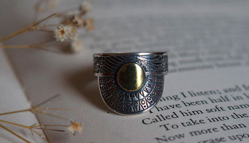 When the sun kisses the sea, astronomy ring in sterling silver and brass