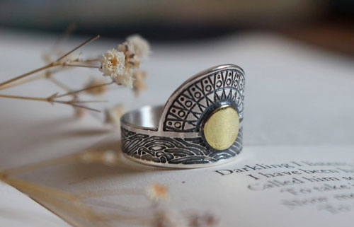 When the sun kisses the sea, astronomy ring in sterling silver and brass