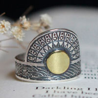 When the sun kisses the sea, astronomy ring in sterling silver and brass
