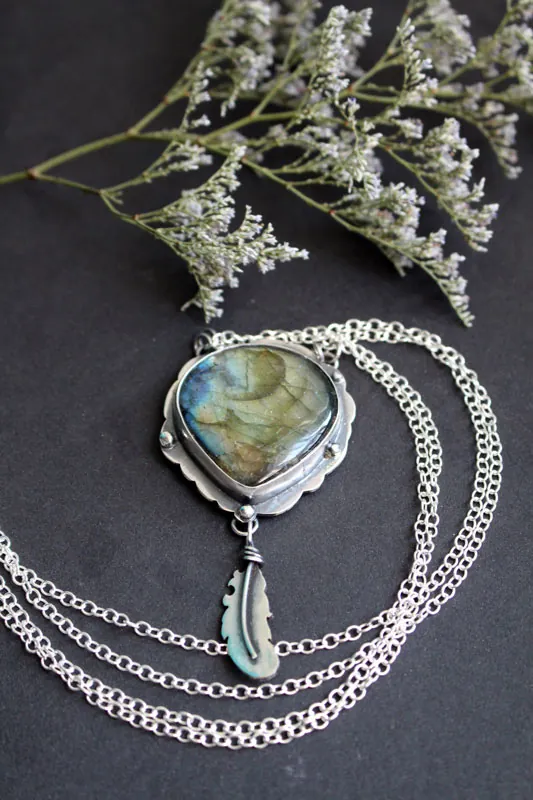 A bird left a feather at my window, elven necklace in silver and labradorite