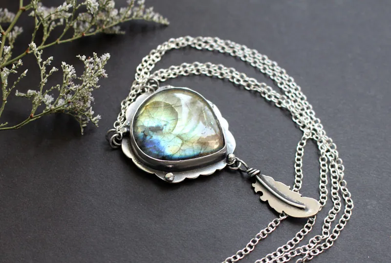 A bird left a feather at my window, elven necklace in silver and labradorite