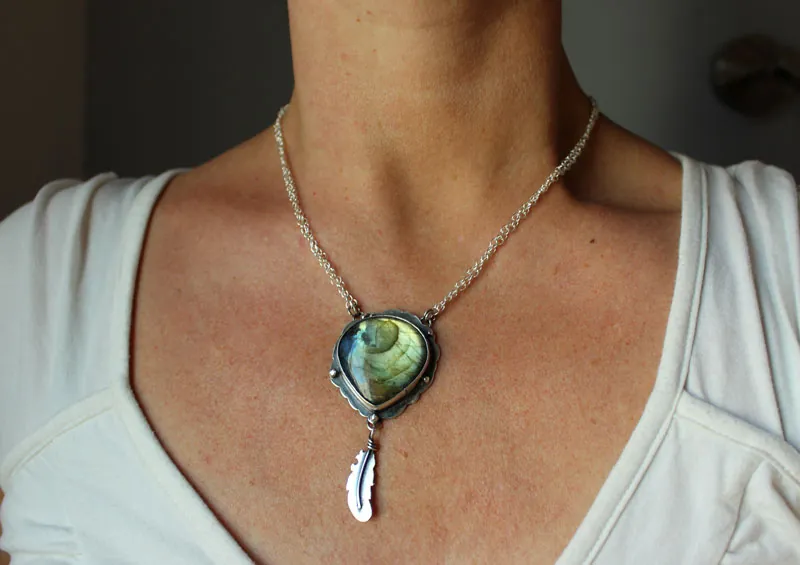 A bird left a feather at my window, elven necklace in silver and labradorite