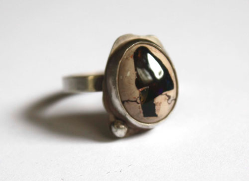 A thousand fires, a pyrotechnic spectacle ring in silver and fire opal