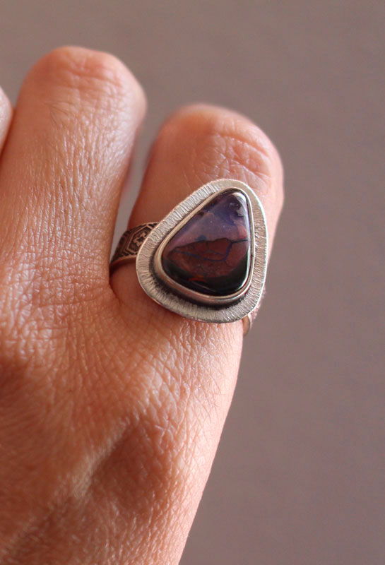A world in balance, volcano ring in silver and boulder opal