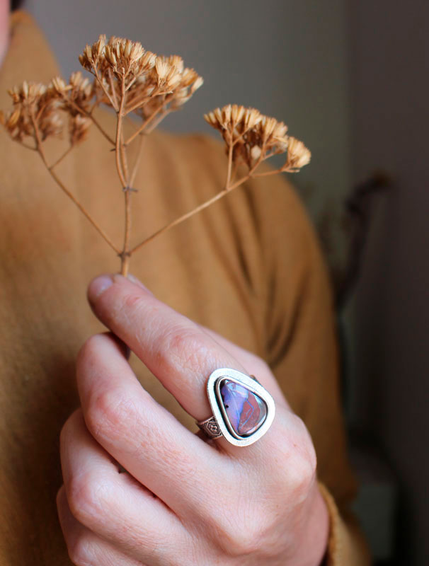 A world in balance, volcano ring in silver and boulder opal