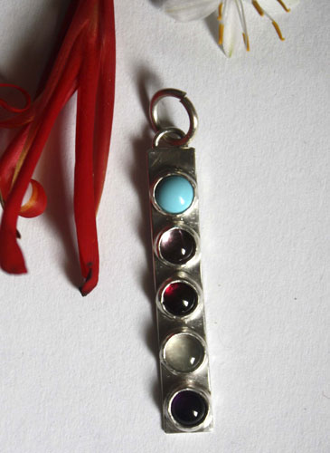 Anuha, family birthstone pendant in silver, turquoise, alexandrite, amethyst, garnet and aquamarine