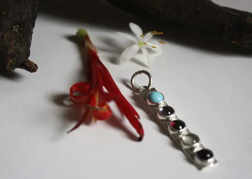 Anuha, family birthstone pendant in silver, turquoise, alexandrite, amethyst, garnet and aquamarine