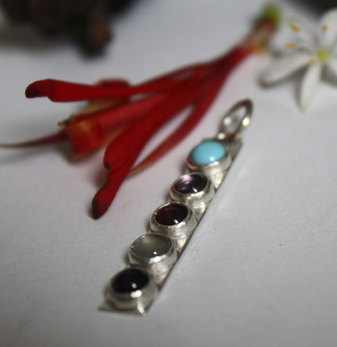 Anuha, family birthstone pendant in silver, turquoise, alexandrite, amethyst, garnet and aquamarine