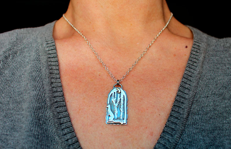 At the heart of the night, weasel in the forest necklace in silver and brass