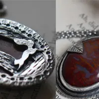 Autumn gathering by a squirrel beside a lake, landscape pendant in silver and moss agate