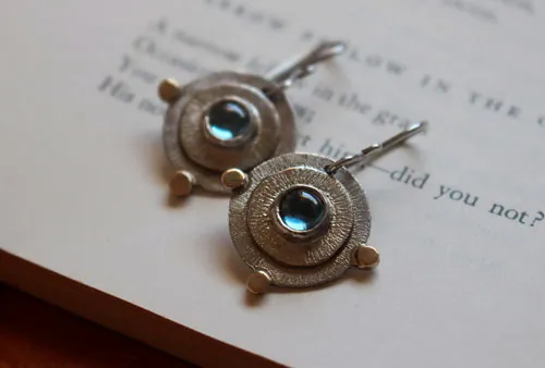 Azure sun, escape earrings in silver, gold and blue zircon