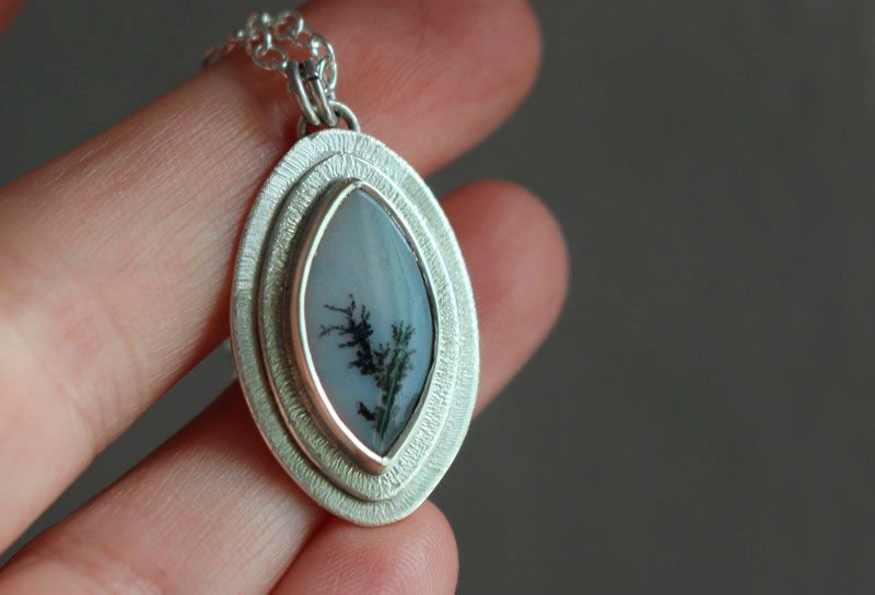A flower in the desert, growth necklace in silver and dendritic agate