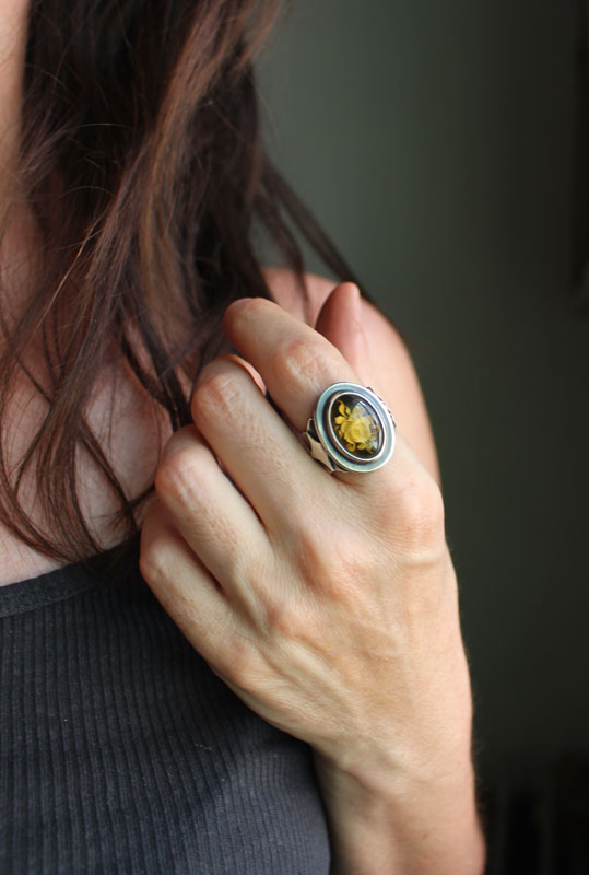 A rose under the stars, intaglio flower ring in silver and amber
