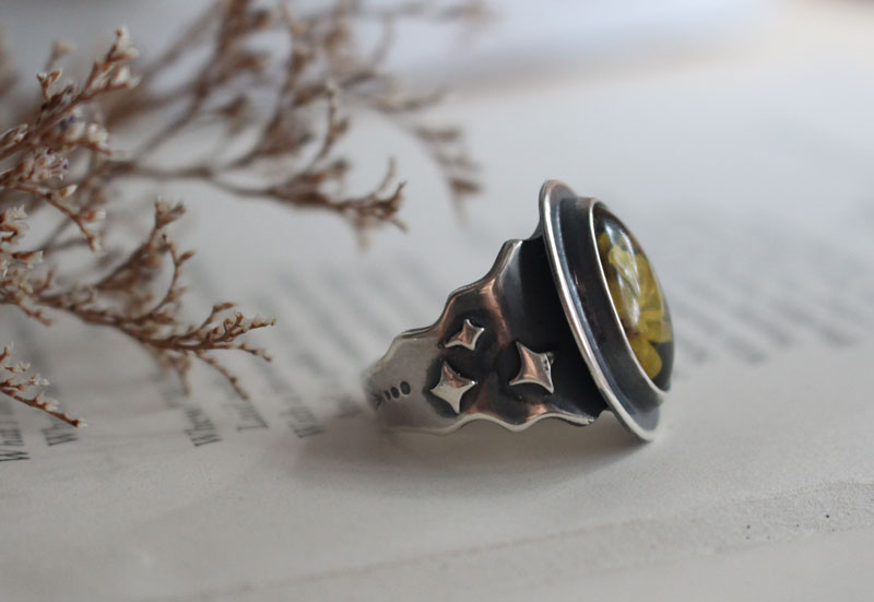 A rose under the stars, intaglio flower ring in silver and amber