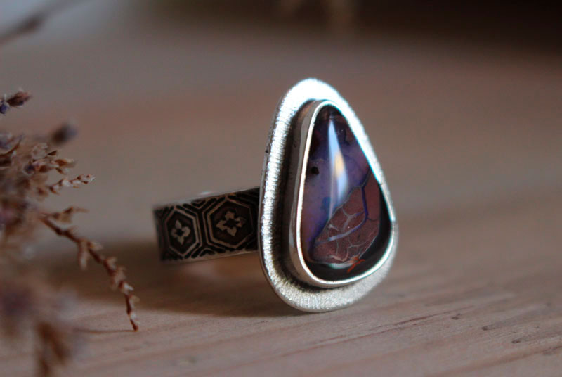 A world in balance, volcano ring in sterling silver and boulder opal
