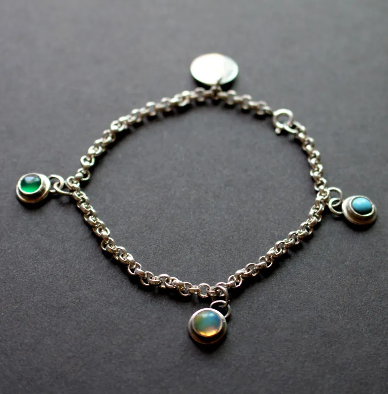 Birthstones, family bracelet in silver, opal, turquoise and onyx