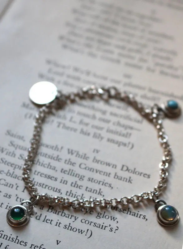 Birthstones, family bracelet in silver, opal, turquoise and onyx