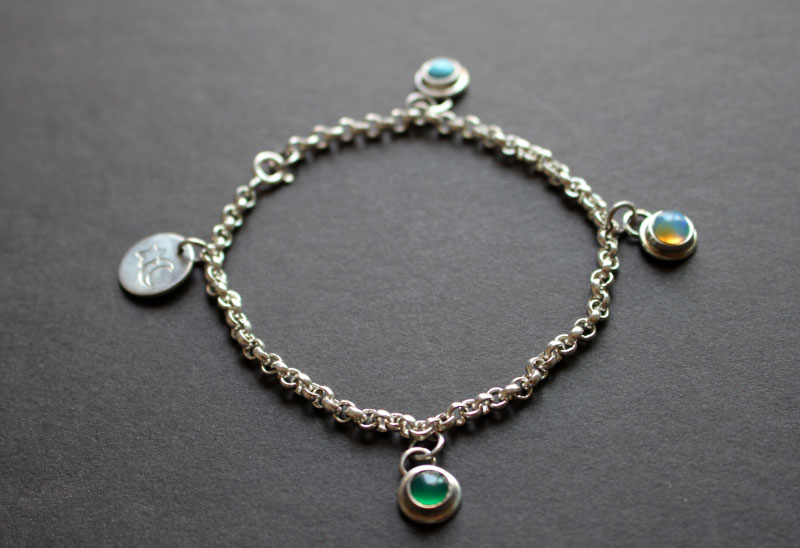 Birthstones, family bracelet in silver, opal, turquoise and onyx