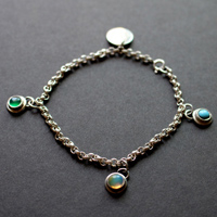 Birthstones, family bracelet in silver, opal, turquoise and onyx