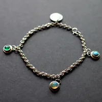 Birthstones, family bracelet in silver, opal, turquoise and onyx