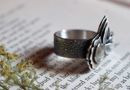 Blooming under the universe, flower and petals ring in silver and transparent sapphire