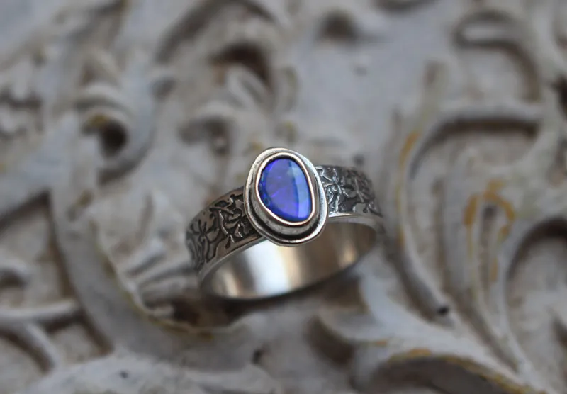 Blue iris, flower ring in silver and boulder opal