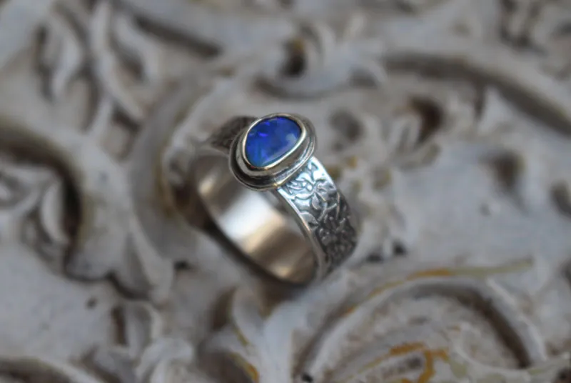 Blue iris, flower ring in silver and boulder opal