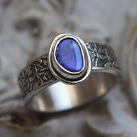 Blue iris, flower ring in silver and boulder opal