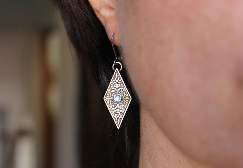 Belladonna, Renaissance floral earrings in silver and blue zircon